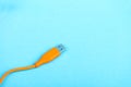USB Cable Plug isolated on Blue Background Royalty Free Stock Photo