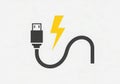 Usb charging cable with lightning bolt icon Royalty Free Stock Photo
