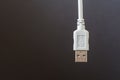 USB connection cable was placed in white on a grey background Royalty Free Stock Photo