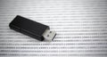 USB flash disk on binary code Royalty Free Stock Photo