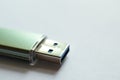 USB flash drive on neutral background with copy space Royalty Free Stock Photo