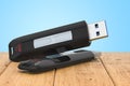 USB flash drive on the wooden planks, 3D rendering Royalty Free Stock Photo