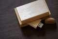 Usb flash drive with wooden surface in box for USB port plug-in computer laptop for transfer data and backup business concept Royalty Free Stock Photo