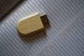 Usb flash drive in wooden surface on note page for USB port plug-in computer laptop for transfer data and backup business concept Royalty Free Stock Photo