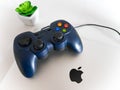 USB Gamepad Controller Attached to Apple Macbook Pro Laptop Concept