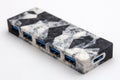 USB hub with a modern marble design, featuring multiple ports for seamless connectivity Royalty Free Stock Photo