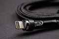usb lightning white data cable on dark background Royalty Free Stock Photo