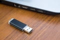 USB memory stick or flash drive and laptop computer Royalty Free Stock Photo