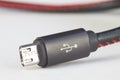 USB plug jack cable with symbol on white background. Electronics, communications, technology