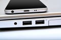 USB ports with smartphone laptop closeup Royalty Free Stock Photo