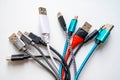 USB and smartphone cables and connectors of various types and colours. Royalty Free Stock Photo