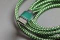 USB Type-C cable. Selective focus with shallow depth of field. Royalty Free Stock Photo