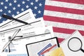 USCIS form I-130 petition for alien relative lies on flat lay office table and ready to fill. U.S. Citizenship and Immigration Royalty Free Stock Photo