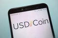 USD Coin USDC cryptocurrency logo displayed on smartphone