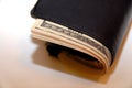 USD currency notes in a black leather wallet Royalty Free Stock Photo