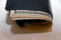USD currency notes in a black leather wallet Royalty Free Stock Photo