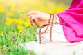 Use of Mala with mantras during a yoga practice Royalty Free Stock Photo