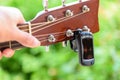 Use metronome function in digital guitar tuner Royalty Free Stock Photo