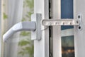 Use of restrictor opening PVC windows at airing the room. Royalty Free Stock Photo