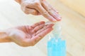 Use sanitizer gel for cleaning the hand for protect health from disease