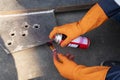 Use spray Liquid Penetrant into the brush with process Penetrant Testing Royalty Free Stock Photo