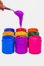 Use trowel scoop purple color from the can. Royalty Free Stock Photo