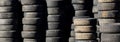 Used auto tires stacked in piles