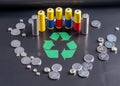 Used batteries and recycling symbol. Concept of ecological safety and eco friendly behavior Royalty Free Stock Photo