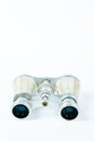 Used binoculars with perl grips on white background - elegance tool Royalty Free Stock Photo