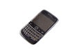 Used Blackberry smartphone with QWERTY keyboard isolated on a white background with copy space