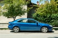 Used blue Mazda 6 car parked on the street in the city Royalty Free Stock Photo