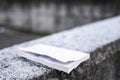 Used book on a grey wall covered with thin ice frosty snow Royalty Free Stock Photo