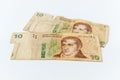 Used and broken 10 Pesos argentinian banknotes