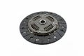 Used car clutch with damper springs and friction linings, isolated on a white background.