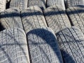 Used car tires. Rubber wheel tires. Recycling of old worn-out truck tires. Background Royalty Free Stock Photo