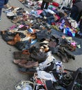 used clothes and shabby clothing in an outdoor flea market