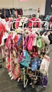 Used clothes on clothes stand at clothes bazaar Royalty Free Stock Photo