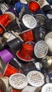 Used coffee capsules of various colors and flavors