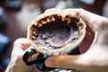 Used coffee ground left in a coffee dripper. Coffee grounds can be used as a fertilizer.