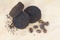 Used coffee grounds after espresso machine and coffee beans Royalty Free Stock Photo