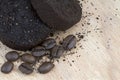 Used coffee grounds after espresso machine and coffee beans Royalty Free Stock Photo