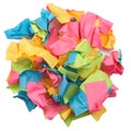 Used colorful stickers notes heap isolated on white. Top view. Stationery colored sticky notes