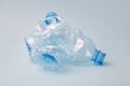 Used crushed pet plastic bottles on blue