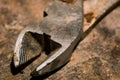 Used diagonal pliers on the metal surface, soft focus