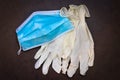 Used, infected with virus, covid19 individual white disposable gloves and a medical blue Used, infected with virus, indivi
