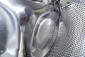 Used inside washing machine drum with some scratches on metal Royalty Free Stock Photo