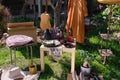 Used items and clothes for garage sale in front yard. Royalty Free Stock Photo