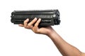 Used laser toner cartridge holding by hand of worker or user for replace, refill with white background. Laser toner for eco and