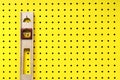 Used level hanging on pegboard