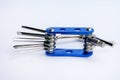 Used multi-tool for bicycle on a white background Royalty Free Stock Photo